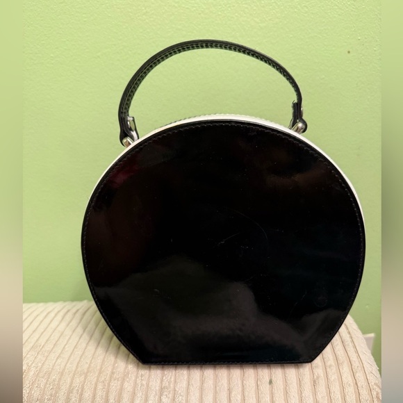 Black Round Handbag with pink silk polka dots lining - Picture 2 of 9